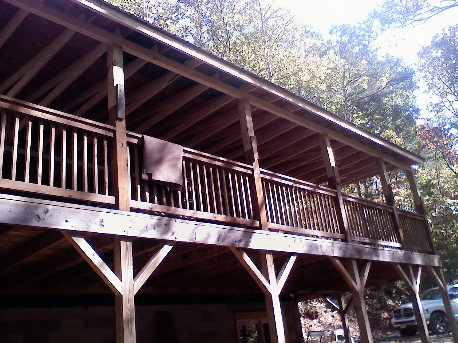 Timber framing under a new elevated porch and deck — Roof Leak Repair in Cross by Roofing Brothers